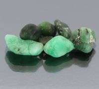 Untreated 11.23ct collectors uncut Emerald set