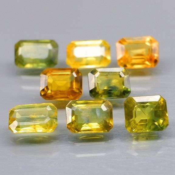 Full fire! 5.02ct top golden green Sapphire set