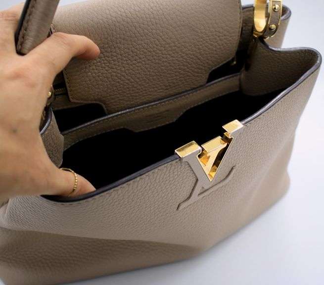 Authentic Louis Vuitton Taurillon calf skin leather in beige Capucines BB Galet handbag