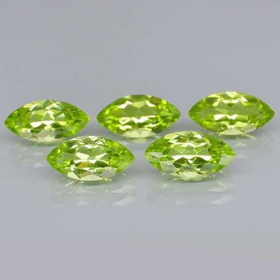 Dazzling 5.51ct untreated apple green Peridot set