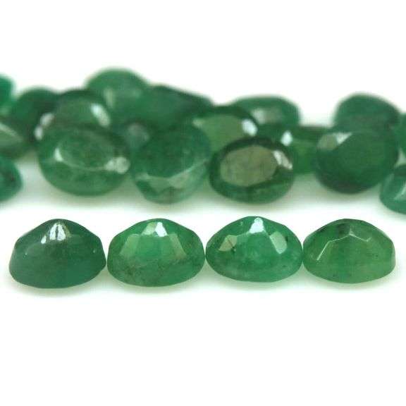Oval cut 8.11ct Zambian Emerald set