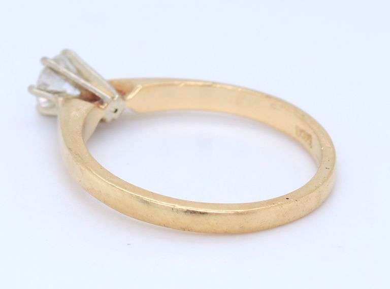 14kt Yellow gold diamond solitaire ring