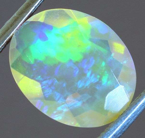 Captivating 1.62ct fully faceted fairy fire jelly Opal