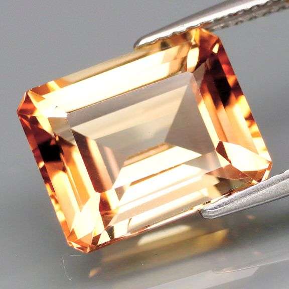Lavish 7.07ct emerald cut Imperial Topaz