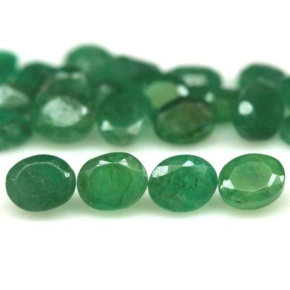 Oval cut 8.11ct Zambian Emerald set