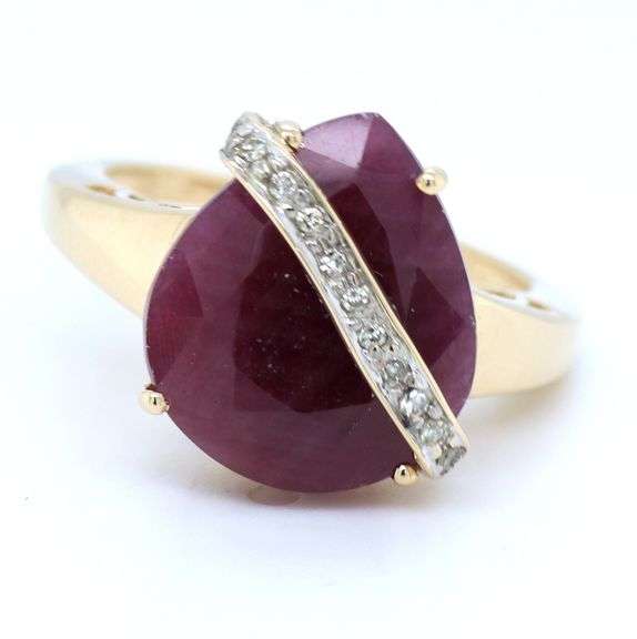 10kt Yellow gold Pear ruby and diamond ring with bar over ruby