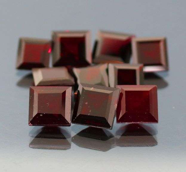 Heavy 24.50ct untreated princess cut Garnet set