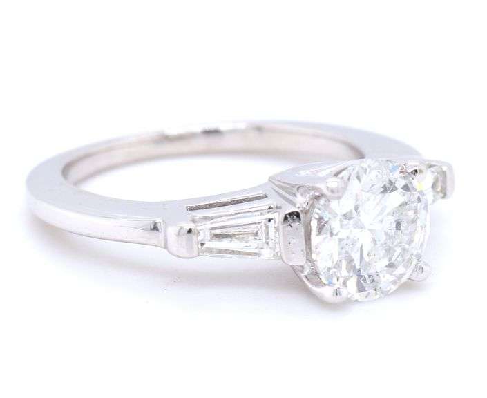 14kt White gold 1.51ct round brilliant cut in 0.20ctw baguette setting engagement ring