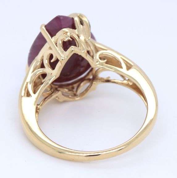 10kt Yellow gold Pear ruby and diamond ring with bar over ruby