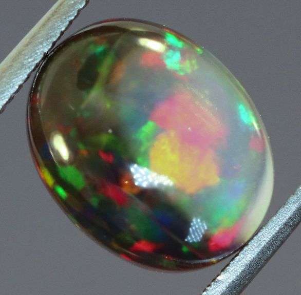 Fiery flashing 1.92ct Ethiopian bi-color Opal