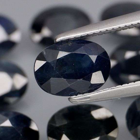 Heated Only! 8.66ct midnight blue Sapphire set