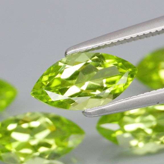 Dazzling 5.51ct untreated apple green Peridot set