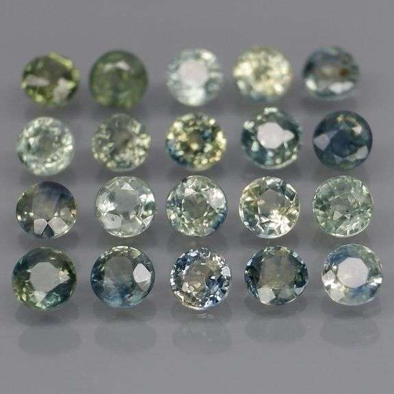 Heated only! 3.35ct blue green Sapphire set