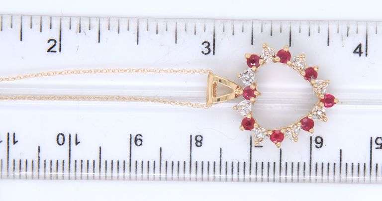 14kt Yellow gold reversible Ruby, Sapphire and diamond heart pendant on chain necklace