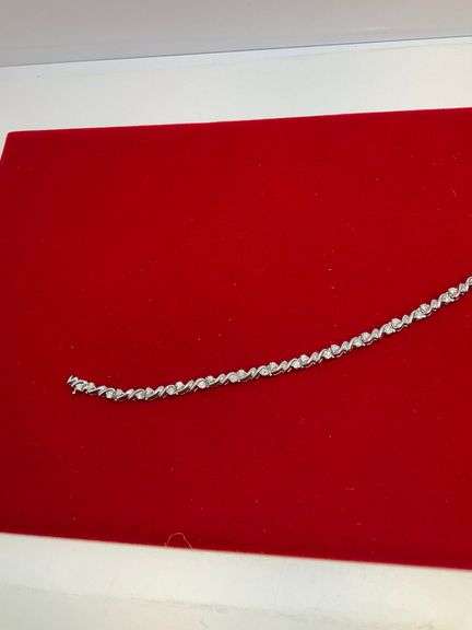 CERTIFIED 14K WHITE GOLD AND DIAMOND BRACELET.
