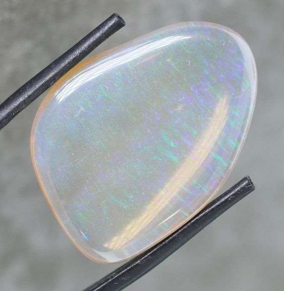 Simply amazing 18.51ct free form Opalized Agate cabochon