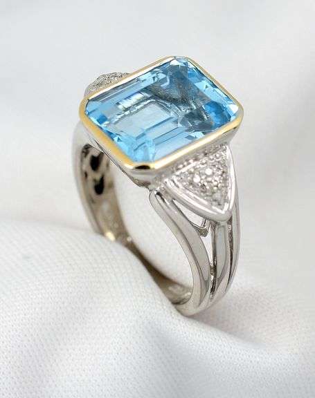 Pretty Blue Topaz and Diamond Ring
