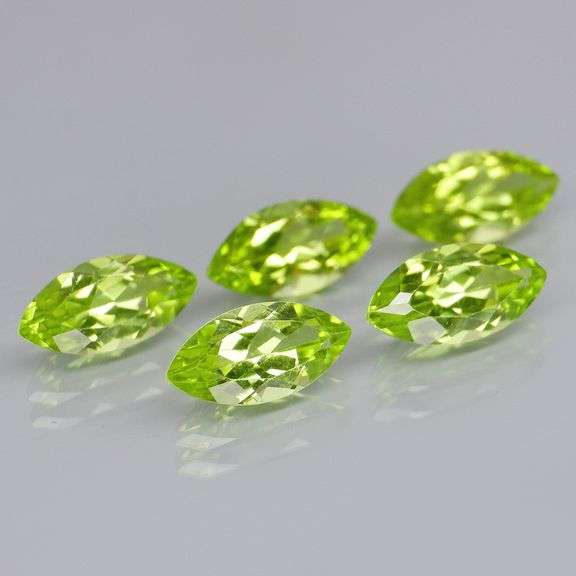 Dazzling 5.51ct untreated apple green Peridot set