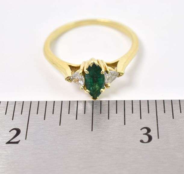 Mesmerizing 18K Yellow Gold Approx. 0.47CTS Emerald and Approx. 0.26CTW Diamond Ring