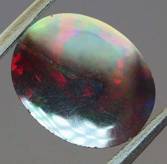 Fiery flashing 1.92ct Ethiopian bi-color Opal