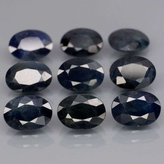 Heated Only! 8.66ct midnight blue Sapphire set