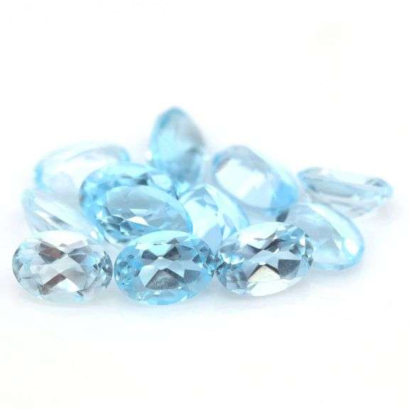 Amazing! 12 piece 11.86ct full fire sky blue Topaz set