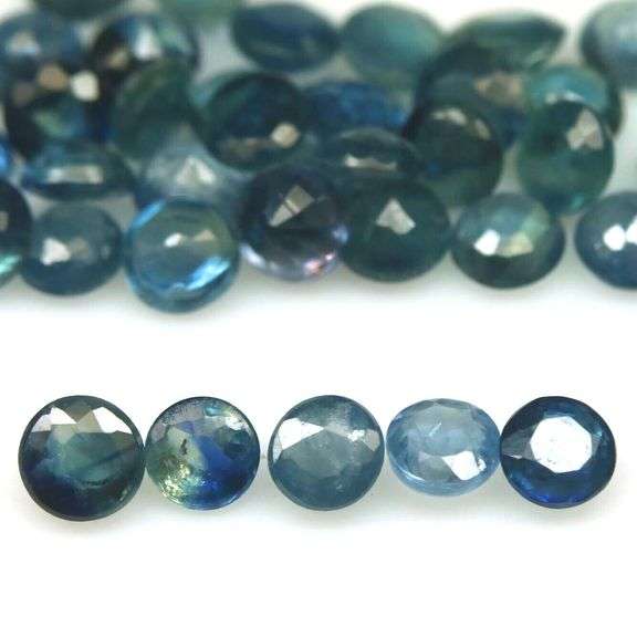 Heated only! 7.74ct greenish blue sapphire set
