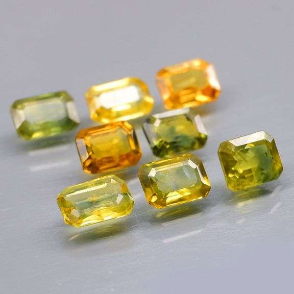 Full fire! 5.02ct top golden green Sapphire set