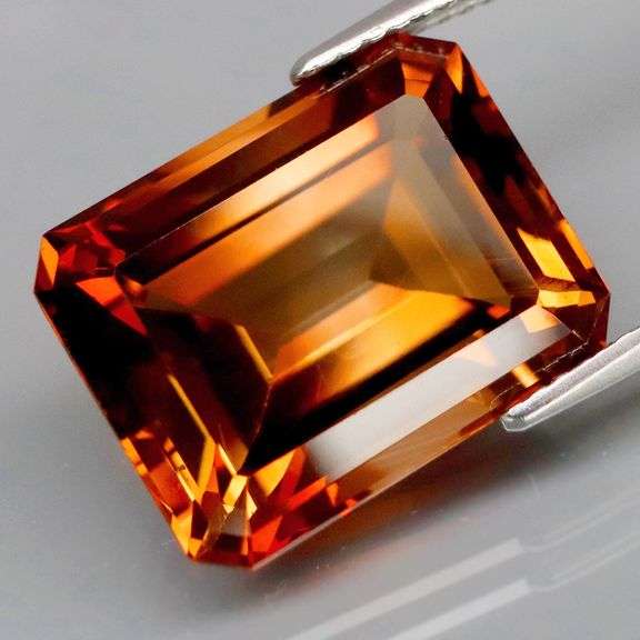 Lavish 13.27ct emerald cut Imperial Topaz