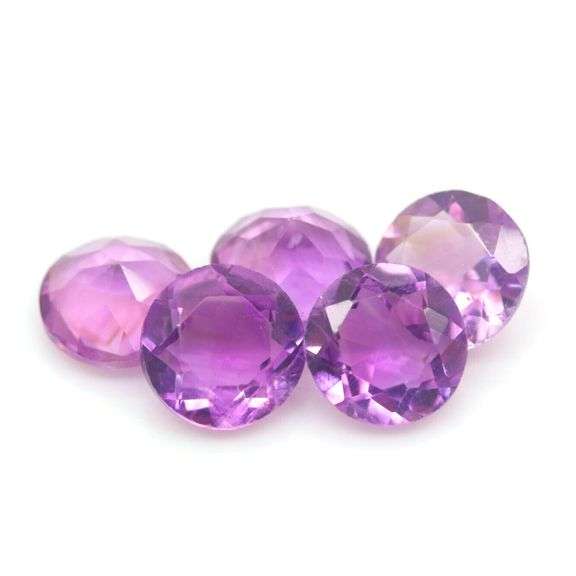 Glittering 16.24ct round cut Brazilian Amethyst set