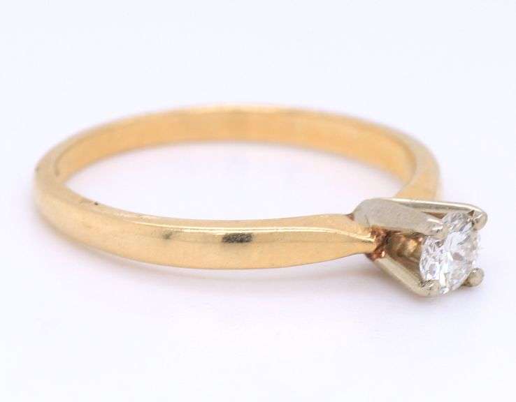 14kt Yellow gold diamond solitaire ring