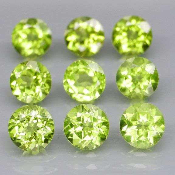 Fantastic 4.90ct 5mm round brilliant cut Peridot set