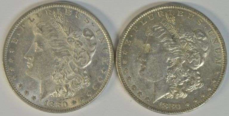 Pair of high grade near Mint 1880-O Morgan Silver Dollars