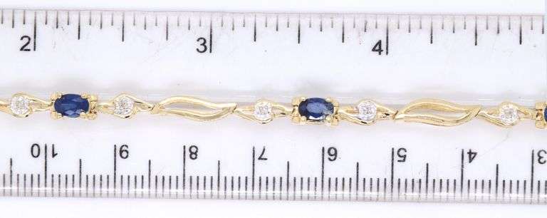 14kt Yellow gold 2.50ctw sapphire and diamond bracelet