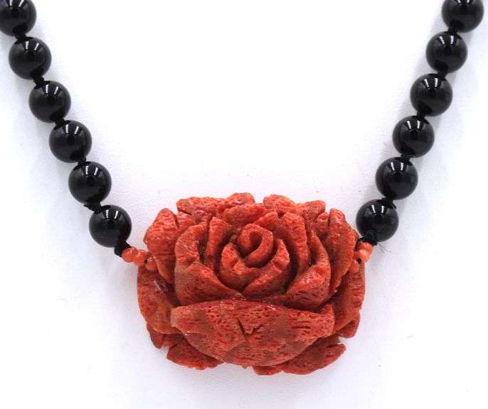 Coral flower pendant on black onyx beads necklace