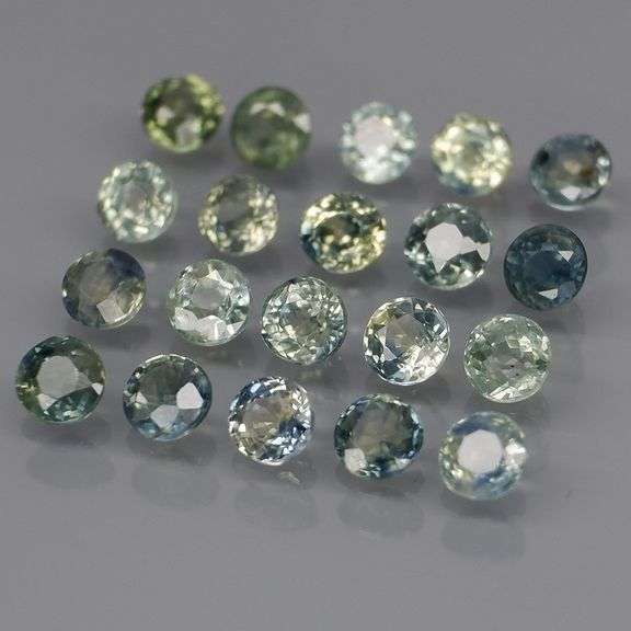 Heated only! 3.35ct blue green Sapphire set