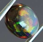 Fiery flashing 1.92ct Ethiopian bi-color Opal