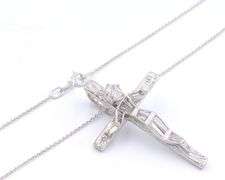 18kt White gold 1.05ctw baguette and oval diamond crucifix pendant on chain