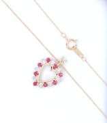10kt Yellow gold ruby and diamond heart shaped pendant on chain necklace