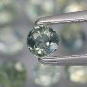 Heated only! 3.35ct blue green Sapphire set