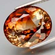 Captivating 12.92ct bi-color Imperial Topaz