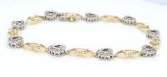 10kt Yellow gold diamond heart station bracelet