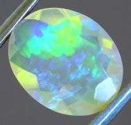 Captivating 1.62ct fully faceted fairy fire jelly Opal
