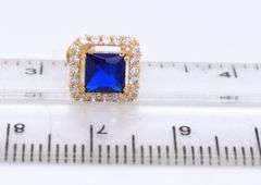 Set of 18kt yellow gold blue synthetic sapphire and CZ ring, earrings and necklace