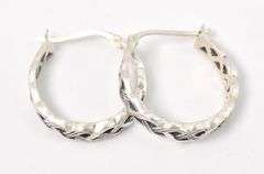 Delightful Celtic Knot Hoop Earrings in Sterling Silver