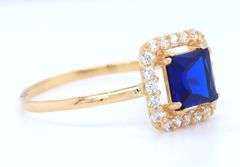 Set of 18kt yellow gold blue synthetic sapphire and CZ ring, earrings and necklace