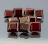 Heavy 24.50ct untreated princess cut Garnet set