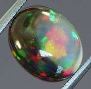 Fiery flashing 1.92ct Ethiopian bi-color Opal