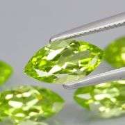Dazzling 5.51ct untreated apple green Peridot set
