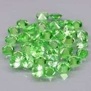 Rare 2.44ct untreated bright green Tsavorite set
